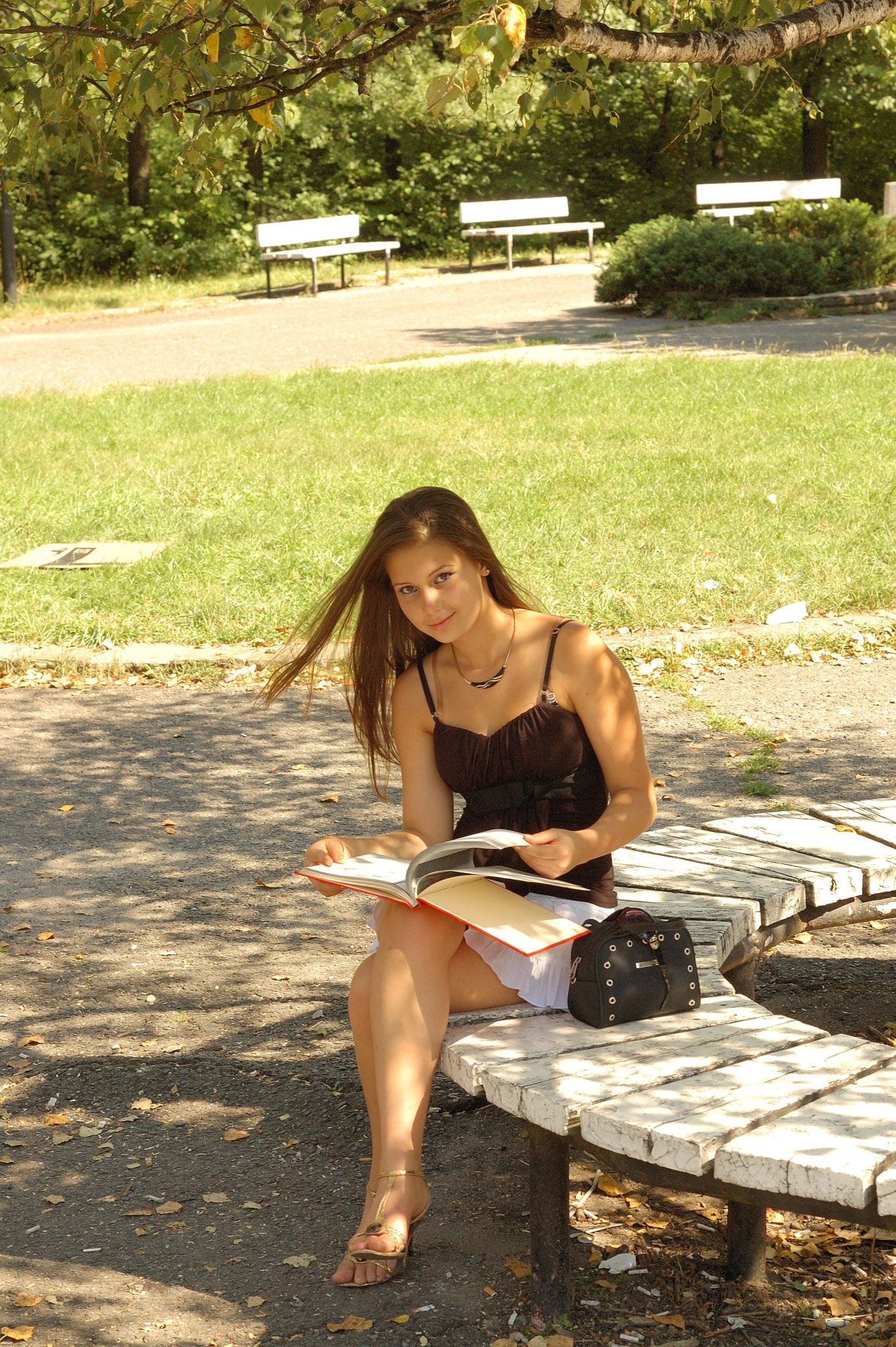 Cute girl reading a book